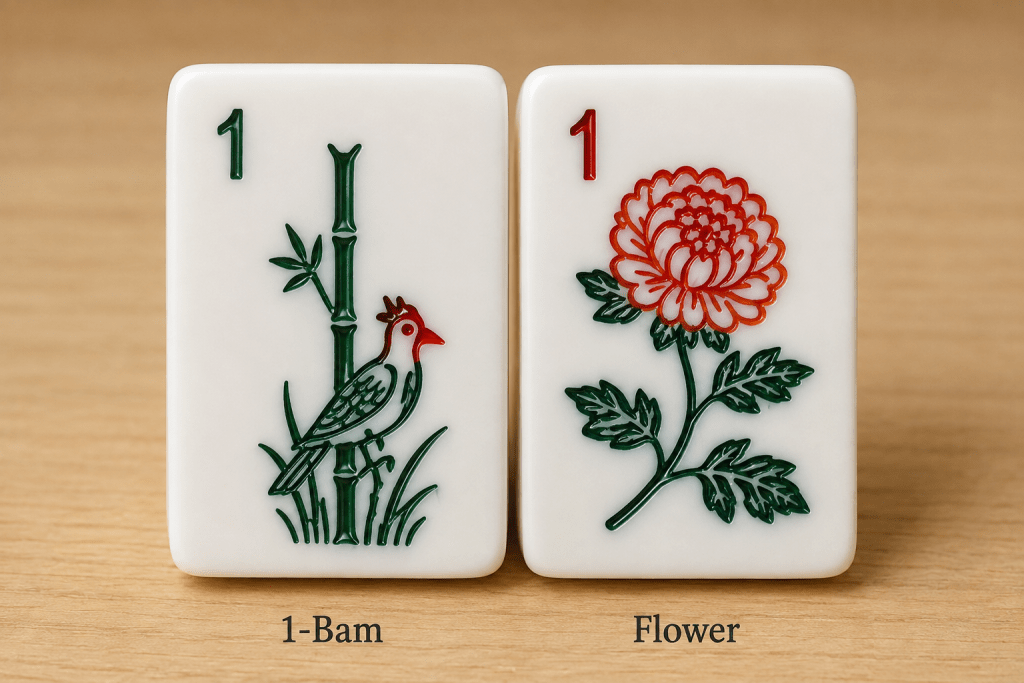 Close-up comparison of the 1-Bam tile's bird design next to a Flower tile, showing how they're easy to confuse at a glance